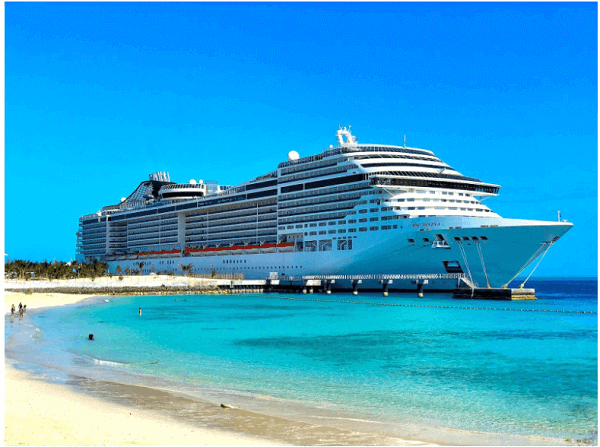 A picture of a cruise ship at the port; another all-inclusive option that Royal Holiday Vacation Club can help you book for your next vacation
